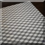 DR01. Custom rug with 3D cube pattern. 13'3” x 18' 